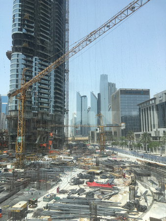 Random construction site near Burj Khalifa.  Building a Dubai skyscraper.